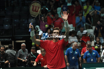 2023-09-16 - Nicolas Jarry celebrates at the end of the group A match of the Davis tennis cup final Canada vs Chile at Unipol arena, won 6-4 6-4 - Bologna, Italy, September 16, 2023 - photo c.b.the - 2023 DAVIS CUP - CANADA VS CHILE - INTERNATIONALS - TENNIS