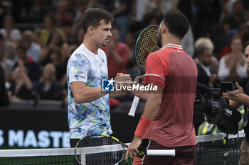 2023-10-31 - Winner Daniel Altmaier of Germany shakes hands with Arthur Fils of France at the net during day 2 of the Rolex Paris Masters 2023, ATP Masters 1000 tennis tournament on October 31, 2023 at Accor Arena in Paris, France - TENNIS - ATP - ROLEX PARIS MASTERS 2023 - INTERNATIONALS - TENNIS