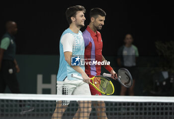 2023-10-31 - Miomir Kecmanovic and Novak Djokovic of Serbia playing doubles during day 2 of the Rolex Paris Masters 2023, ATP Masters 1000 tennis tournament on October 31, 2023 at Accor Arena in Paris, France - TENNIS - ATP - ROLEX PARIS MASTERS 2023 - INTERNATIONALS - TENNIS