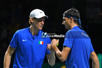 2023-11-25 - Jannik Sinner and Lorenzo Sonego
during the
Finals Davis Cup 2023 match 
Italy vs Serbia
the Palacio Martin Carpena, Spain in Malaga on 
November 25, 2023 - DAVIS CUP - INTERNATIONALS - TENNIS