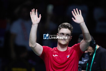 2023-11-23 - Miomir Kecmanovic of Serbia celebrates after winning in match 1 during the Davis Cup Finals 2023, Quarter-finals tennis match between Serbia and Great Britain on November 23, 2023 at Martin Carpena Pavilion in Malaga, Spain - TENNIS - DAVIS CUP FINALS 2023 - 1/4 - SERBIA V GREAT BRITAIN - INTERNATIONALS - TENNIS