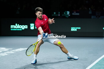 2023-11-23 - Miomir Kecmanovic of Serbia in match 1 during the Davis Cup Finals 2023, Quarter-finals tennis match between Serbia and Great Britain on November 23, 2023 at Martin Carpena Pavilion in Malaga, Spain - TENNIS - DAVIS CUP FINALS 2023 - 1/4 - SERBIA V GREAT BRITAIN - INTERNATIONALS - TENNIS