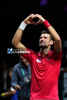 2023-11-23 - Novak Djokovic of Serbia celebrates after winning in match 2 during the Davis Cup Finals 2023, Quarter-finals tennis match between Serbia and Great Britain on November 23, 2023 at Martin Carpena Pavilion in Malaga, Spain - TENNIS - DAVIS CUP FINALS 2023 - 1/4 - SERBIA V GREAT BRITAIN - INTERNATIONALS - TENNIS