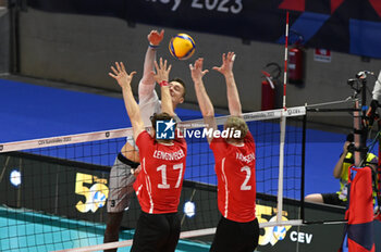 03/09/2023 - Switzerland's Lengweiler Alexander #17 and Switzerland's Harksen Peer #2 block - ESTONIA VS SWITZERLAND - EUROVOLLEY MEN - VOLLEY