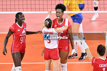2023-08-26 - Amandha Sylves of France celebrates with Amandine Giardino of France - CEV EUROVOLLEY 2023 - WOMEN - EIGHT FINAL - FRANCE VS ROMANIA - INTERNATIONALS - VOLLEYBALL