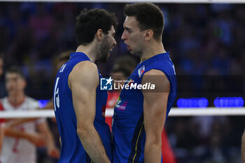 2023-09-14 - Daniele Lavia (ITA) and Alessandro Michieletto (ITA) during the CEV Eurovolley 2023 semifinal match between Italy vs France, Palazzo dello Sport in Rome, Italy, on September 14, 2023. - SEMIFINAL - ITALY VS FRANCE - CEV EUROVOLLEY MEN - VOLLEYBALL