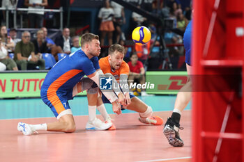 2023-09-12 - The Netherlands' Gijs Jorna and The Netherlan ds' Robbert Andringa in action - QUARTER FINAL - ITALY VS THE NETHERLANDS - CEV EUROVOLLEY MEN - VOLLEYBALL