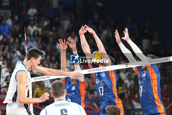 2023-09-12 - Italy's Alessandro Michieletto in action, The Netherlands' Michael Parkinson block the ball with his face - QUARTER FINAL - ITALY VS THE NETHERLANDS - CEV EUROVOLLEY MEN - VOLLEYBALL