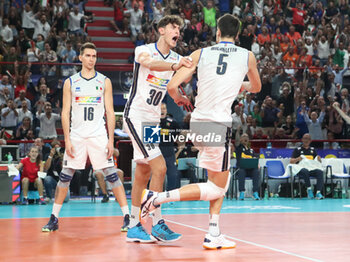 2023-09-12 - Italy's Leandro Mosca and Italy's Alessandro Michieletto joy - QUARTER FINAL - ITALY VS THE NETHERLANDS - CEV EUROVOLLEY MEN - VOLLEYBALL