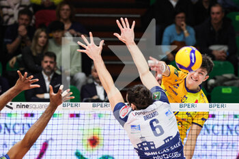 2023-03-19 - Tommaso Rinaldi and Brizard (Valsa Group Modena)(Gas Sales Bluenergy Piacenza) In action during the match of Gara 1 Playoff Scudetto SuperLega championship season 22/23 at Palapanini in Modena (Italy) on 19th of March 2023 - PLAY OFF - VALSA GROUP MODENA VS GAS SALES BLUENERGY PIACENZA - SUPERLEAGUE SERIE A - VOLLEYBALL