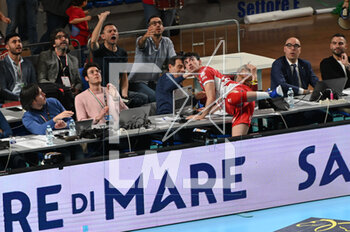 2023-05-04 - Gabriele Laurenzano #13 (Itas Trentino) recovers a ball in the journalists' station - PLAY OFF - FINAL - CUCINE LUBE CIVITANOVA VS ITAS TRENTINO - SUPERLEAGUE SERIE A - VOLLEYBALL