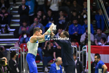 2024-04-26 - PETROUNIAS Eleftherios (GRE) RIngs with his coach - EUROPEAN ARTISTIC GYMNASTIC CHAMPIONSHIPS - MEN - GYMNASTICS - OTHER SPORTS