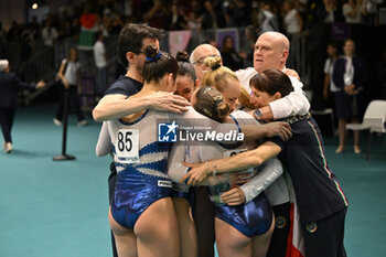 2024-05-05 - Team Italy with coaches celebrating - EUROPEAN ARTISTIC GYMNASTIC CHAMPIONSHIPS - WOMEN - GYMNASTICS - OTHER SPORTS