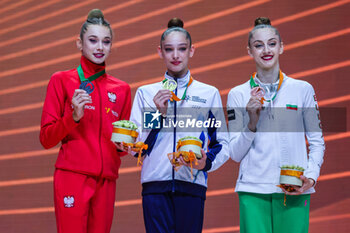 2024-05-26 - (L-R) Podium Finals Clubs Senior with Liliana Lewinska (POL) silver medal, Daniela Munits (ISR) gold medal and Boryana Kaleyn (BUL) bronze medal during 40th European Rhythmic Gymnastics Championships Budapest 2024 at Papp Laszlo Budapest Sportarena, Budapest, Hungary on May 26, 2024 - 40TH EUROPEAN RHYTHMIC CHAMPIONSHIPS SENIOR INDIVIDUALS & GROUPS AND JUNIOR INDIVIDUALS - GYMNASTICS - OTHER SPORTS