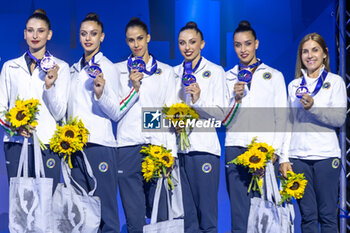 2024-06-23 - Team Italy silver medal during Group Finals All-Around of FIG Rhythmic Gymnastics World Cup, at Unipol Forum, Milan on 23 June, 2024 - RHYTHMIC GYMNASTIC - WORLD CUP 2024 FINALS - GYMNASTICS - OTHER SPORTS