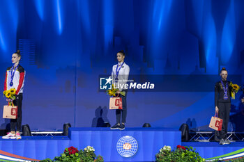 2024-06-23 - Podium Individual Finals Ribbon of FIG Rhythmic Gymnastics World Cup, at Unipol Forum, Milan on 23 June, 2024 - RHYTHMIC GYMNASTIC - WORLD CUP 2024 FINALS - GYMNASTICS - OTHER SPORTS