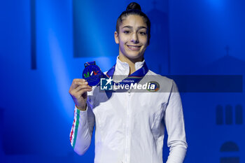 2024-06-23 - RAFFAELI Sofia (Ita) wins silver medal during Individual Finals Ball of FIG Rhythmic Gymnastics World Cup, at Unipol Forum, Milan on 23 June, 2024 - RHYTHMIC GYMNASTIC - WORLD CUP 2024 FINALS - GYMNASTICS - OTHER SPORTS