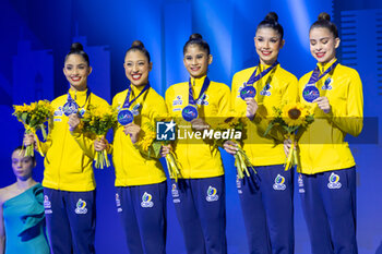 2024-06-23 - Team Brazil wins silver medal during Group Finals 5 Hoops of FIG Rhythmic Gymnastics World Cup, at Unipol Forum, Milan on 23 June, 2024 - RHYTHMIC GYMNASTIC - WORLD CUP 2024 FINALS - GYMNASTICS - OTHER SPORTS