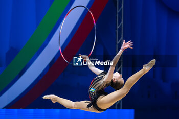 2024-06-23 - IKROMOVA Takhmina (Uzb) during Finals Hoop of FIG Rhythmic Gymnastics World Cup, at Unipol Forum, Milan on 23 June, 2024 - RHYTHMIC GYMNASTIC - WORLD CUP 2024 FINALS - GYMNASTICS - OTHER SPORTS