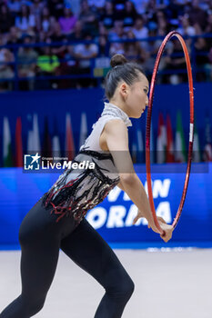 2024-06-23 - WANG Zilu (Chn) during Finals Hoop of FIG Rhythmic Gymnastics World Cup, at Unipol Forum, Milan on 23 June, 2024 - RHYTHMIC GYMNASTIC - WORLD CUP 2024 FINALS - GYMNASTICS - OTHER SPORTS