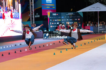 11/09/2024 - The Chinese couple, Li Ran and Sun Xin Zhao, third place in the final of the Inline Freestyle Pair Slalom specialty, during the 