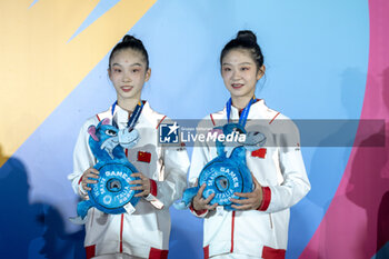 11/09/2024 - The Chinese couple, Wang An Qi and Kuang Ning Xin, second place in the final of the Inline Freestyle Pair Slalom specialty, during the 