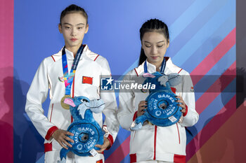 11/09/2024 - The Chinese couple, Zhu Si Yi and Xu Xiao Xiao, first place in the final of the Inline Freestyle Pair Slalom specialty, during the 