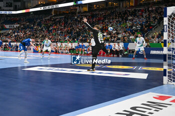 2024-01-11 - Elias Ellefsen a Skipagotu (Faore Islands) scores a goal from penalty 7 meter during the Men’s EHF Euro 2024 match between Slovenia vs. Faroe Islands at the Mercedes-Benz Arena in Berlin, Germany - MEN'S EHF EURO 2024 - SLOVENIA VS FAROE ISLAND - HANDBALL - OTHER SPORTS