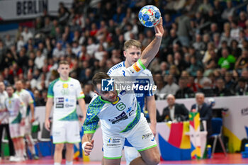 2024-01-11 - Gasper Marguc (Slovenia) shoot from 7 meter during the Men’s EHF Euro 2024 match between Slovenia vs. Faroe Islands at the Mercedes-Benz Arena in Berlin, Germany - MEN'S EHF EURO 2024 - SLOVENIA VS FAROE ISLAND - HANDBALL - OTHER SPORTS