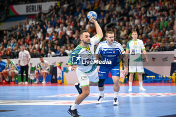 2024-01-11 - Gasper Marguc (Slovenia) shoot 7 meter penalty during the Men’s EHF Euro 2024 match between Slovenia vs. Faroe Islands at the Mercedes-Benz Arena in Berlin, Germany - MEN'S EHF EURO 2024 - SLOVENIA VS FAROE ISLAND - HANDBALL - OTHER SPORTS