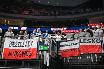 2024-01-11 - Poland supporters sing the national anthems ceremony during the Men’s EHF Euro 2024 match between Norway vs. Poland at the Mercedes-Benz Arena in Berlin, Germany - MEN'S EHF EURO 2024 - NORWAY VS POLAND - HANDBALL - OTHER SPORTS