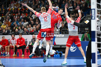 2024-01-11 - Sander Sagosen (Norway) in action against Ariel Pietrasik (Poland) and Michal Olejniczak (Poland) during the Men’s EHF Euro 2024 match between Norway vs. Poland at the Mercedes-Benz Arena in Berlin, Germany - MEN'S EHF EURO 2024 - NORWAY VS POLAND - HANDBALL - OTHER SPORTS