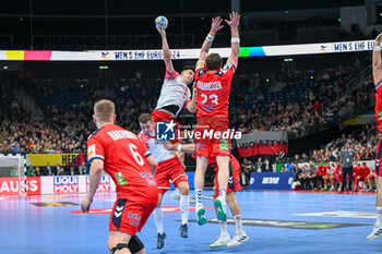 2024-01-11 - Goran Sogard Johannessen (Norway) in action against Szymon Sicko (Poland) during the Men’s EHF Euro 2024 match between Norway vs. Poland at the Mercedes-Benz Arena in Berlin, Germany - MEN'S EHF EURO 2024 - NORWAY VS POLAND - HANDBALL - OTHER SPORTS