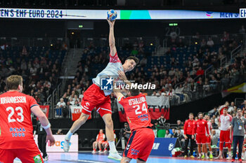 2024-01-11 - Szymon Sicko (Poland) in action against Christian O'Sullivan (Norway) during the Men’s EHF Euro 2024 match between Norway vs. Poland at the Mercedes-Benz Arena in Berlin, Germany - MEN'S EHF EURO 2024 - NORWAY VS POLAND - HANDBALL - OTHER SPORTS