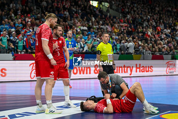 2024-01-13 - Szymon Sicko (Poland) injury during the Men’s EHF Euro 2024 match between Slovenia vs.Poland at the Mercedes-Benz Arena in Berlin, Germany - MEN'S EHF EURO 2024 - POLAND VS SLOVENIA - HANDBALL - OTHER SPORTS
