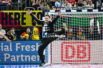 2024-01-13 - Goalkeeper Klemen Ferlin (Slovenia) saves the ball during the Men’s EHF Euro 2024 match between Slovenia vs.Poland at the Mercedes-Benz Arena in Berlin, Germany - MEN'S EHF EURO 2024 - POLAND VS SLOVENIA - HANDBALL - OTHER SPORTS