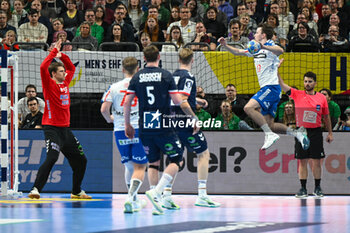 2024-01-13 - Hakun West av Teigum (Faore Islands) scores a goal during the Men’s EHF Euro 2024 match between Faroe Islands vs.Norway at the Mercedes-Benz Arena in Berlin, Germany - MEN'S EHF EURO 2024 - FAROE ISLANDS VS NORWAY - HANDBALL - OTHER SPORTS