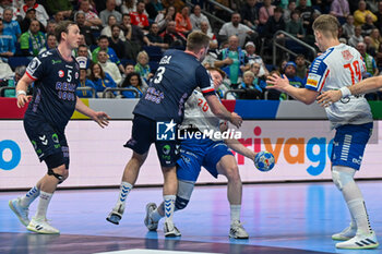 2024-01-13 - Vilhelm Poulsen (Faore Islands) in action against Vetle Eck Aga during the Men’s EHF Euro 2024 match between Faroe Islands vs.Norway at the Mercedes-Benz Arena in Berlin, Germany - MEN'S EHF EURO 2024 - FAROE ISLANDS VS NORWAY - HANDBALL - OTHER SPORTS