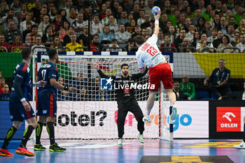 2024-01-14 - Lukas Laube (Swiss) during the Men’s EHF Euro 2024 match between Swiss vs. France at the Mercedes-Benz Arena in Berlin, Germany - MEN'S EHF EURO 2024 - SWITZERLAND VS FRANCE - HANDBALL - OTHER SPORTS