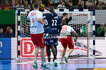 2024-01-14 - Lukas Laube (Swiss) scores a goal during the Men’s EHF Euro 2024 match between Swiss vs. France at the Mercedes-Benz Arena in Berlin, Germany - MEN'S EHF EURO 2024 - SWITZERLAND VS FRANCE - HANDBALL - OTHER SPORTS
