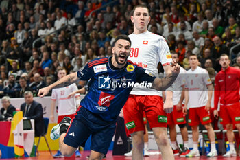 2024-01-14 - Happiness of Hugo Descat (France) after scores a goal during the Men’s EHF Euro 2024 match between Swiss vs. France at the Mercedes-Benz Arena in Berlin, Germany - MEN'S EHF EURO 2024 - SWITZERLAND VS FRANCE - HANDBALL - OTHER SPORTS