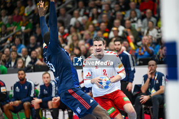 2024-01-14 - Andre Schmid (Swiss) during the Men’s EHF Euro 2024 match between Swiss vs. France at the Mercedes-Benz Arena in Berlin, Germany - MEN'S EHF EURO 2024 - SWITZERLAND VS FRANCE - HANDBALL - OTHER SPORTS