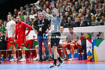 2024-01-14 - Referee assigned goal for Swiss after video replay during the Men’s EHF Euro 2024 match between Swiss vs. France at the Mercedes-Benz Arena in Berlin, Germany - MEN'S EHF EURO 2024 - SWITZERLAND VS FRANCE - HANDBALL - OTHER SPORTS