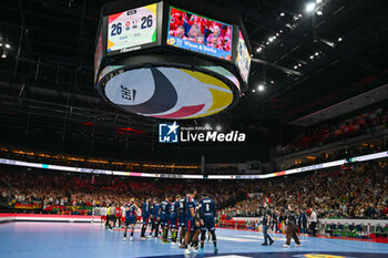 2024-01-14 - Swiss and France teams lined up at the end of the Men’s EHF Euro 2024 match between Swiss vs. France at the Mercedes-Benz Arena in Berlin, Germany - MEN'S EHF EURO 2024 - SWITZERLAND VS FRANCE - HANDBALL - OTHER SPORTS