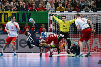 2024-01-14 - Ludovic Fabregas (France) in action against Nikola Portner (Swiss) during the Men’s EHF Euro 2024 match between Swiss vs. France at the Mercedes-Benz Arena in Berlin, Germany - MEN'S EHF EURO 2024 - SWITZERLAND VS FRANCE - HANDBALL - OTHER SPORTS