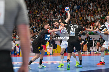 2024-01-14 - Martin Velkovski (North Macedonia) in action against Julian Koster (Germany) during the Men’s EHF Euro 2024 match between North Macedonia vs. Germany at the Mercedes-Benz Arena in Berlin, Germany - MEN'S EHF EURO 2024 - NORTH MACEDONIA VS GERMANY - HANDBALL - OTHER SPORTS