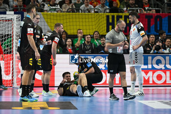 2024-01-14 - Renars Uscins (Germany) injury during the Men’s EHF Euro 2024 match between North Macedonia vs. Germany at the Mercedes-Benz Arena in Berlin, Germany - MEN'S EHF EURO 2024 - NORTH MACEDONIA VS GERMANY - HANDBALL - OTHER SPORTS