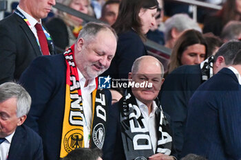 2024-01-14 - German Chancellor Olaf Scholz and DBH German Handball Association
President Andreas Michelmann during the Men’s EHF Euro 2024 match between North Macedonia vs. Germany at the Mercedes-Benz Arena in Berlin, Germany - MEN'S EHF EURO 2024 - NORTH MACEDONIA VS GERMANY - HANDBALL - OTHER SPORTS