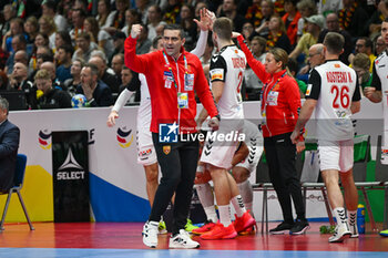 2024-01-14 - Happiness of Head Coach Lazarov Kiril (North Macedonia) during the Men’s EHF Euro 2024 match between North Macedonia vs. Germany at the Mercedes-Benz Arena in Berlin, Germany - MEN'S EHF EURO 2024 - NORTH MACEDONIA VS GERMANY - HANDBALL - OTHER SPORTS