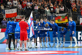 2024-01-15 - Faroe Islands for team photo lined up during the Men’s EHF Euro 2024 match between Poland vs. Faroe Islands at the Mercedes-Benz Arena in Berlin, Germany - MEN'S EHF EURO 2024 - POLAND VS FAROE ISLANDS - HANDBALL - OTHER SPORTS